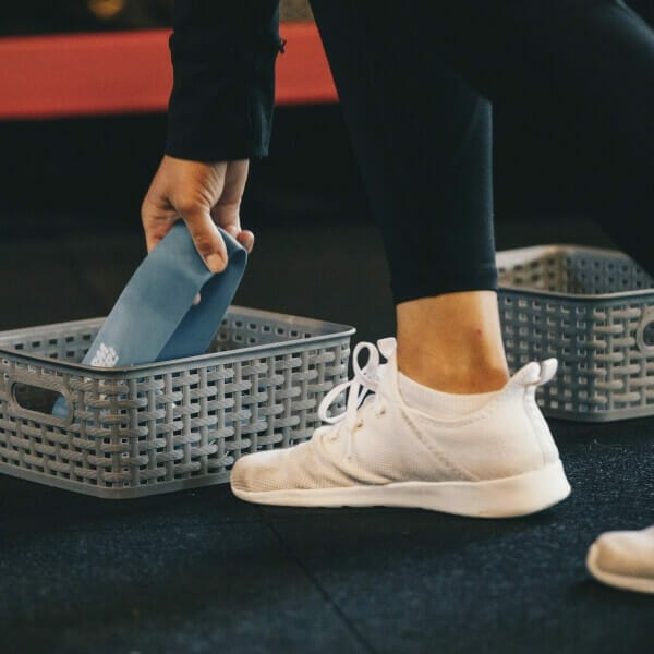 Woman taking equipment from the basket